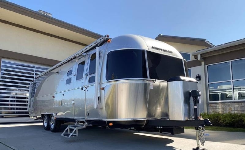 Airstream parked in a driveway