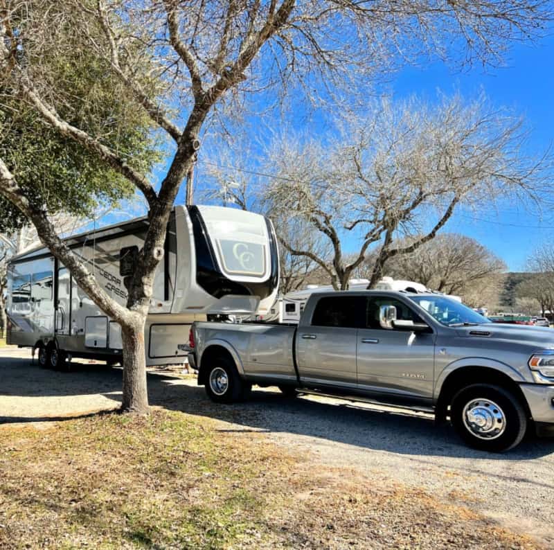 1 ton dually truck connected to a large 5th wheel