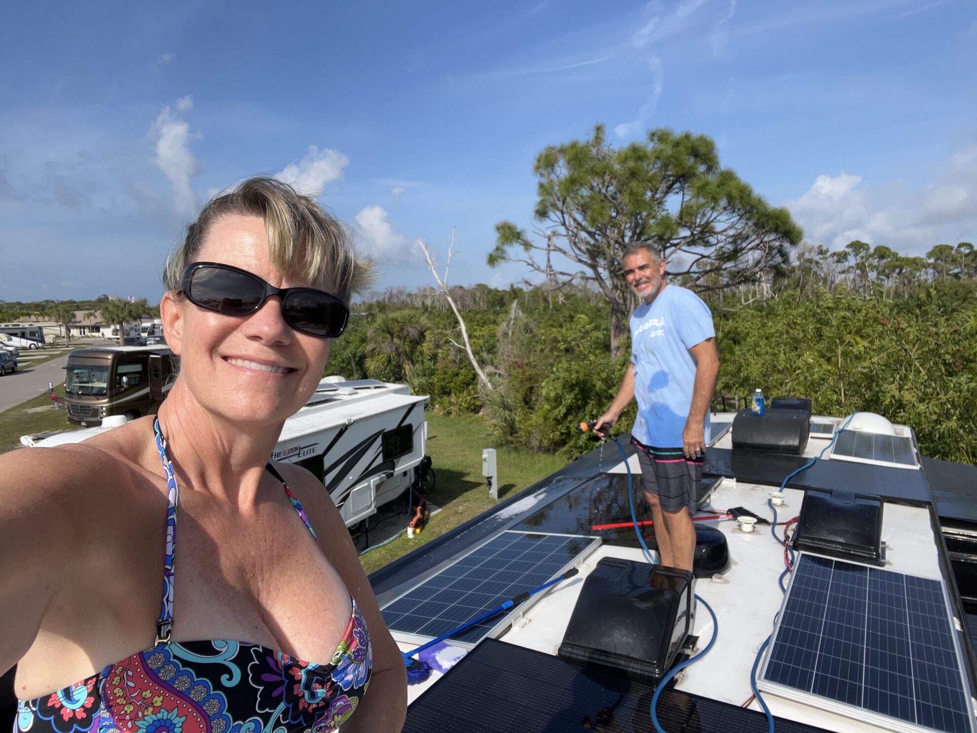 Mike and Susan cleaning their RV roof